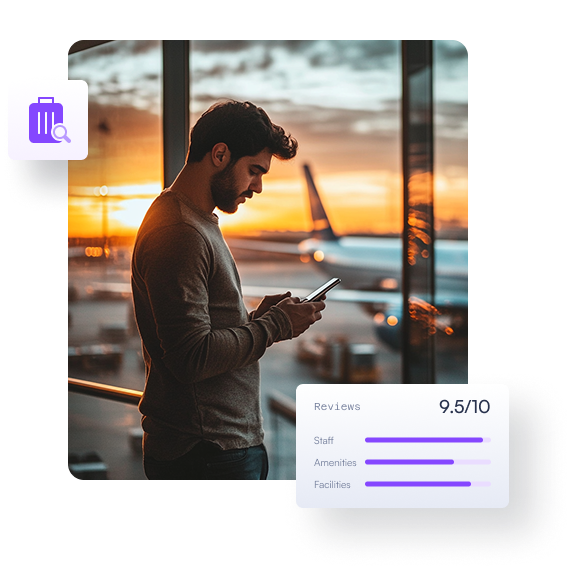 A passenger is waiting to board, looking at his phone, with airplanes outside the window in the background